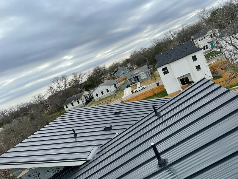 Standing seam metal roof panels with vents for Skylight Repair in Westbury